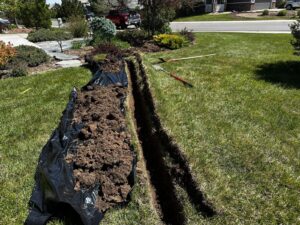 New irrigation system installation with trenching and sprinkler placement in Castle Rock Colorado