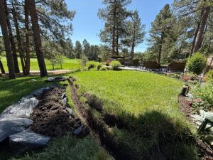 New irrigation system installation with trenching and sprinkler placement in Castle Rock Colorado