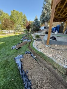 New irrigation system installation with trenching and sprinkler placement in Castle Rock Colorado